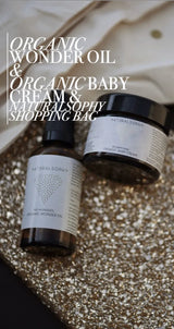 Bio Familienpflege-Set: Organic Wonder Oil 50ml, Organic Baby Cream & Naturalsophy Tasche in Schwarz